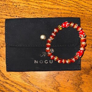NOGU Red Beaded Bracelet with Black Pouch